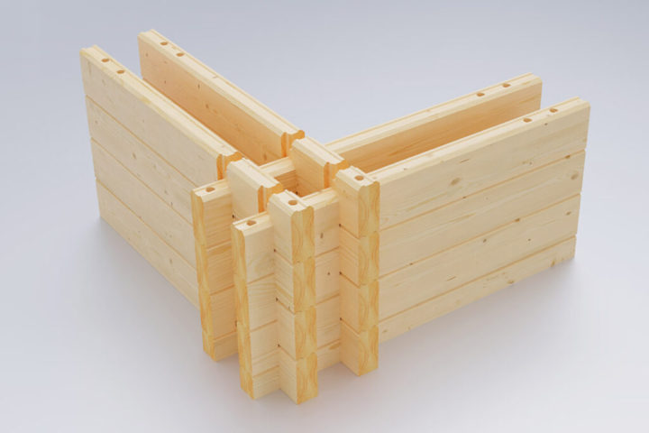 Doppelblockbohlenwand-Muster für ein Finnholz-Blockhaus, relevant für KfW40 Fördermöglichkeiten.
