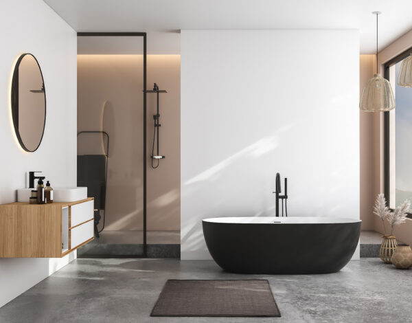 Modern gestaltetes Badezimmer in einem Holzhaus mit frei stehender Badewanne und minimalistischer Einrichtung.